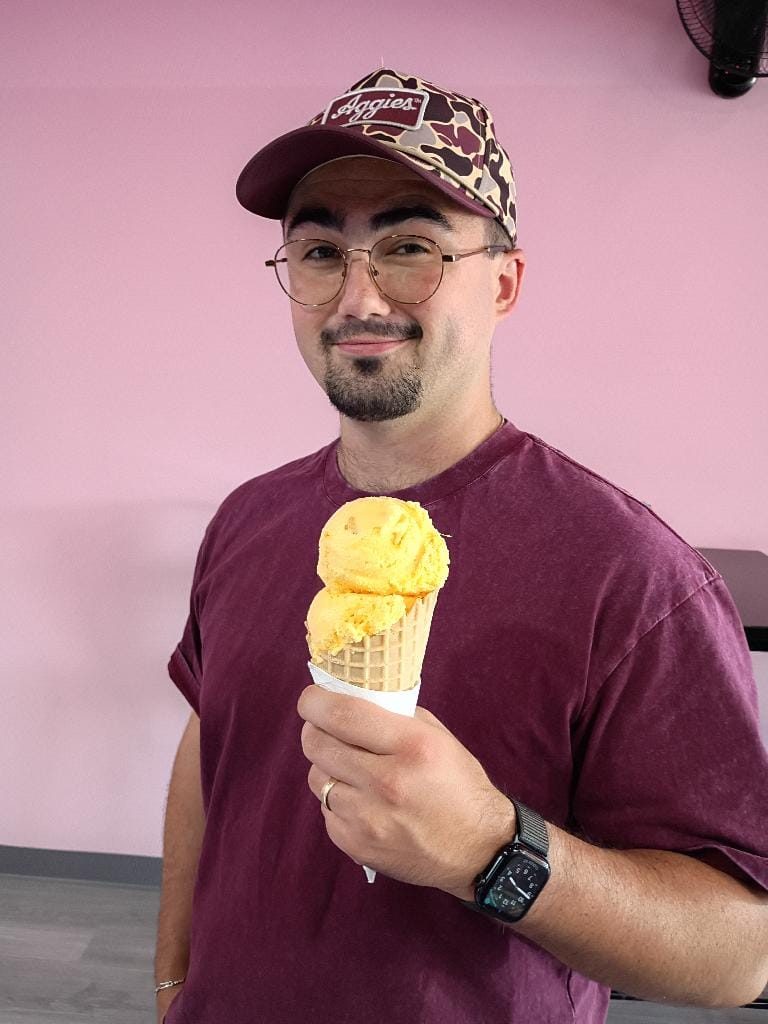 Customer holding a scoop cone