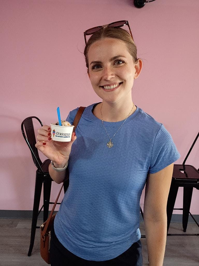 Customer with an ice cream cone at Scoops