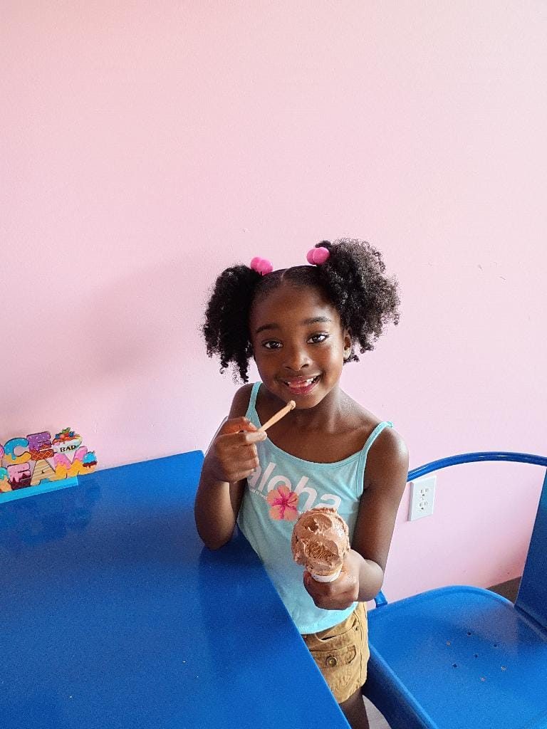 Guest with a milkshake at Scoops